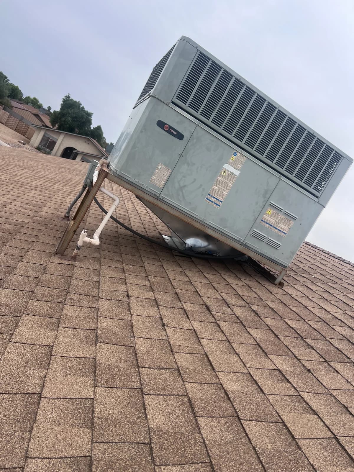Original rooftop packaged HVAC system before replacement by Cool Fox