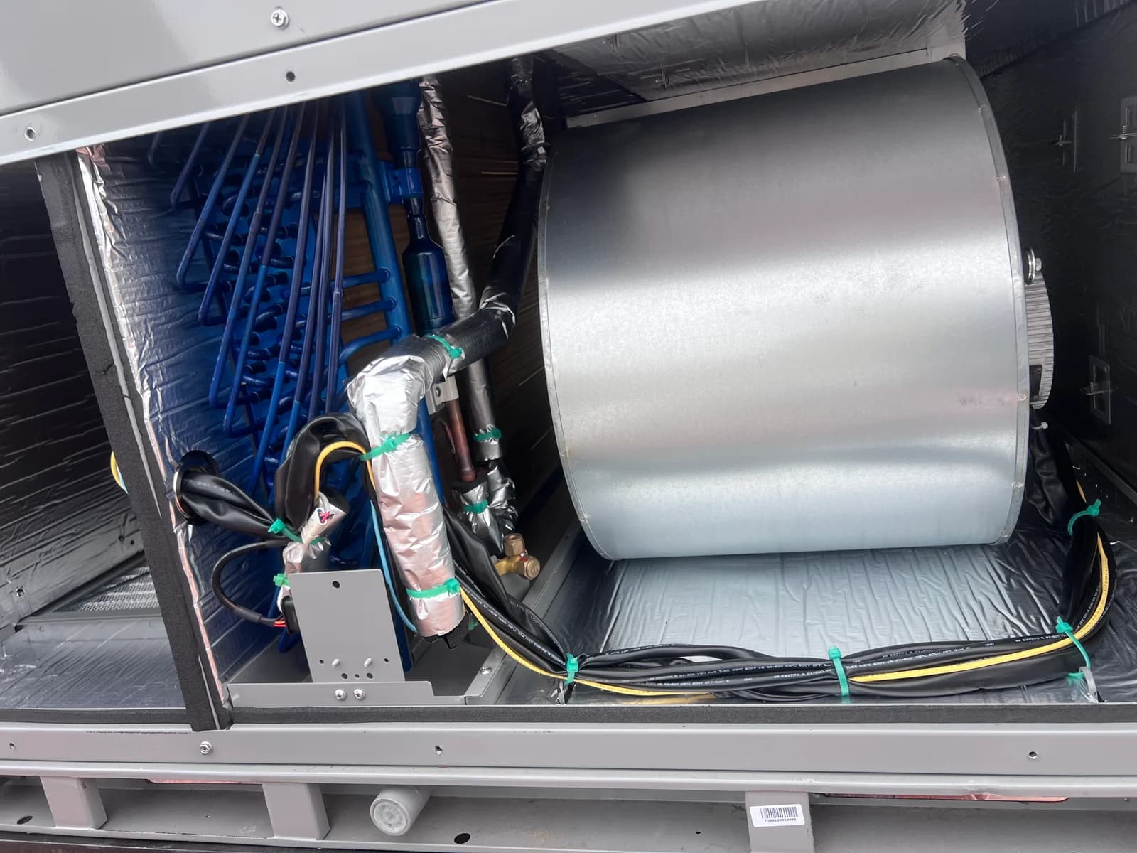 Blower motor and wheel assembly exposed for detailed inspection